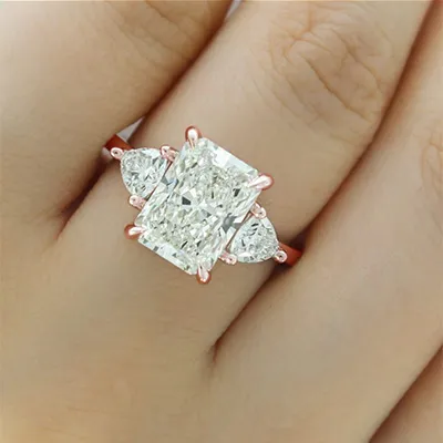 Rose Gold Elegant Open Floating Profile Three Stone Engagement Ring jewelry store near me