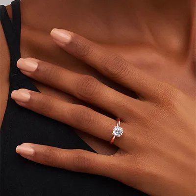 Rose Gold Simple Elegant and Easy Solitare Engagement Ring from best jeweler