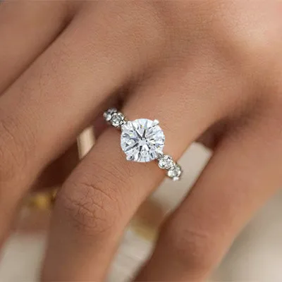 Platinum Compass Set Shared Prong Diamond Engagement Ring jewelry online