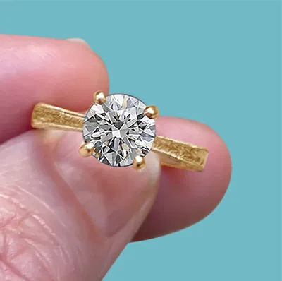 Yellow Gold Elegant and Classic Solitaire Engagement Ring from best jeweler