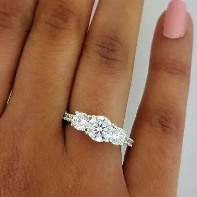 White GoldDistinctive Three Stone Timeless Engagement Ring jewelry Wabash avenue