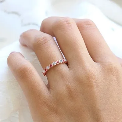 Rose Gold Diamond And Ruby Eternity Wedding Band jewelry store near me