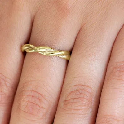 Yellow Gold Metal Twist Wedding Band In Gold And Platinum jewelry Wabash avenue