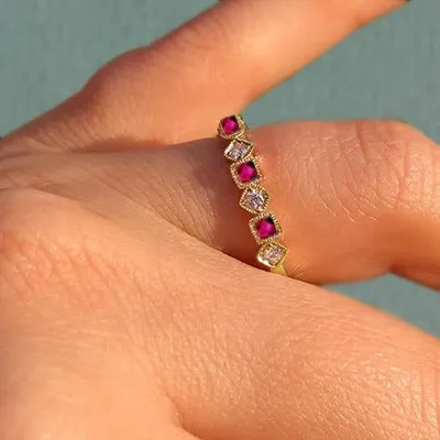 Yellow Gold Eye-Catching Eternity Band in Ruby and Round Cut Diamonds jewelry store near me