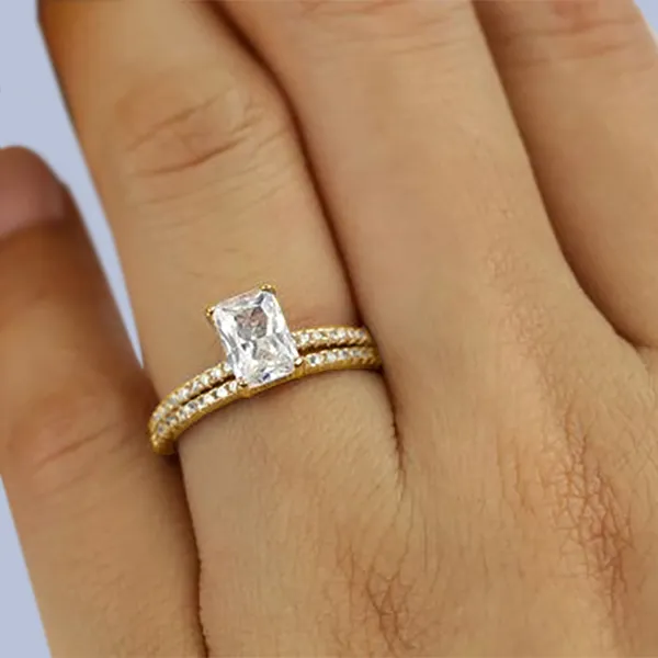 Yellow Gold Engagement And Wedding Ring Set At Jewelry Store from best jeweler